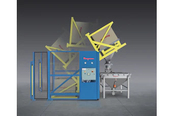 Industrial Heliodyne processing system with blue frame, yellow mechanical arms, and control panel on gray background