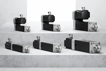 Industrial stepper motors and linear actuators in varying sizes displayed on concrete surface