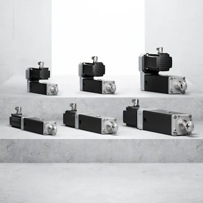 Industrial stepper motors and linear actuators in varying sizes displayed on concrete surface
