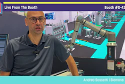Man in Siemens polo shirt presents industrial automation equipment at Pack Expo booth S-4266